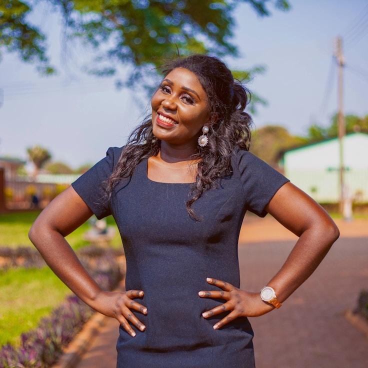 Aarav Singh, Lead Design Curator at MeadowTrailCalm, reviewing corporate floral arrangements